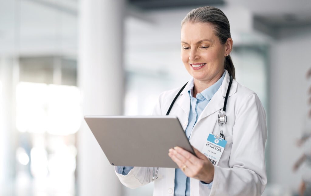 tit senior woman doctor and tablet with hospital hea 2023 11 27 05 28 35 utc